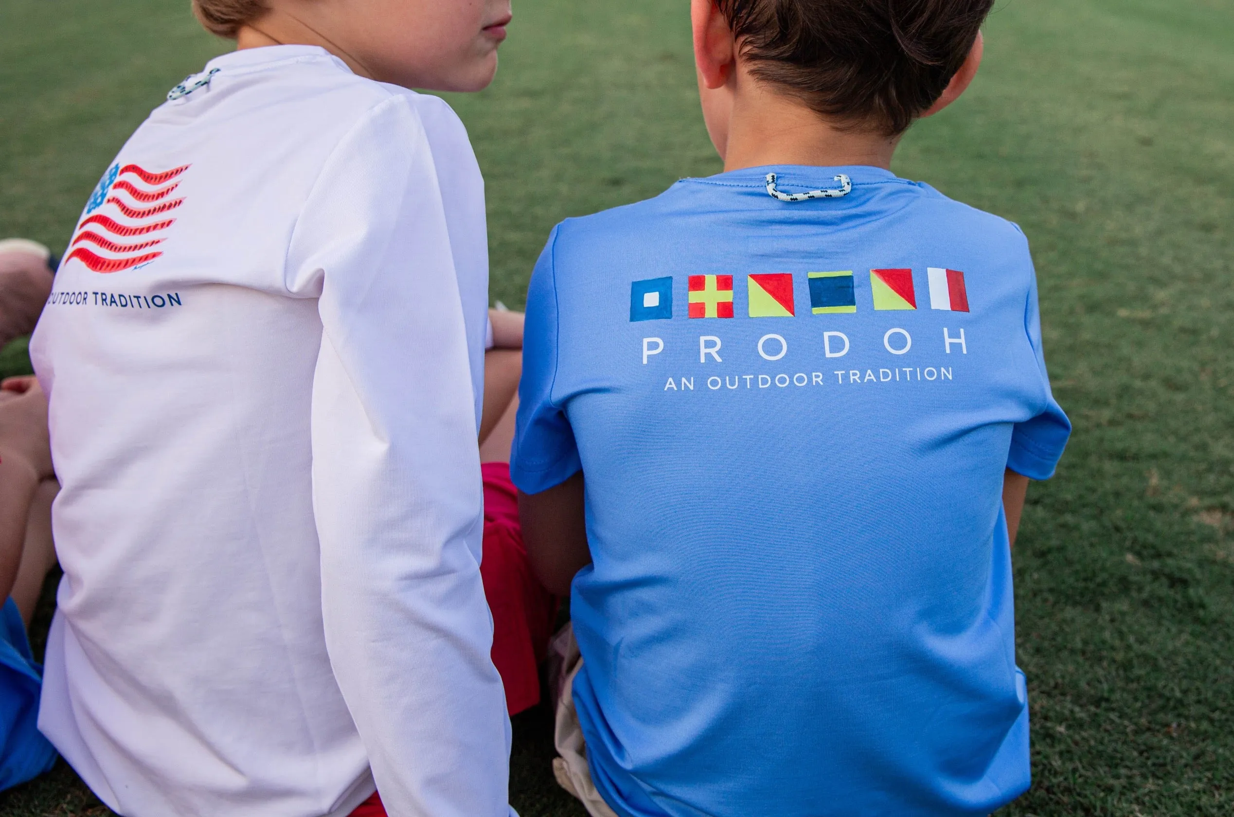 Kids Pro Performance Short Sleeve Fishing T-shirt in Marina Blue with Nautical Flags